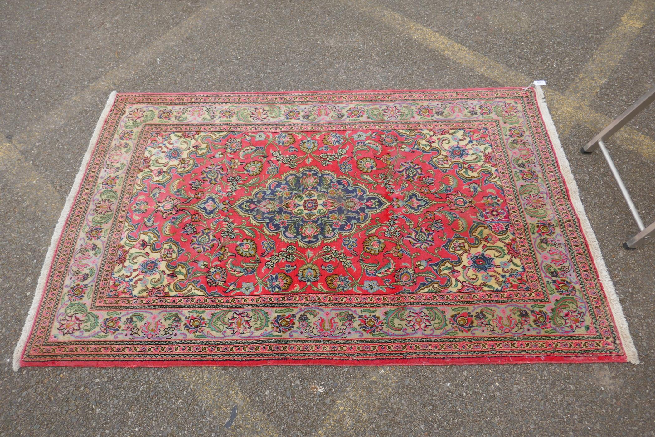 A very fine hand woven Persian Kashan rug with floral medallion design on a pink field, patched, 172 - Image 2 of 9