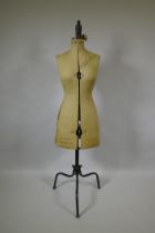 A vintage tailor's dummy, bust size 32-39", raised on metal swivel base, 150cm high