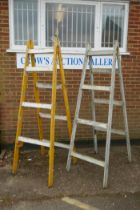 A pair of antique painted wood decorator's trestles, AF,  70cm wide, 220cm high