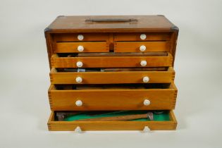 A vintage engineer's metal mounted tool chest with contents, 43 x 22cm, 29cm high