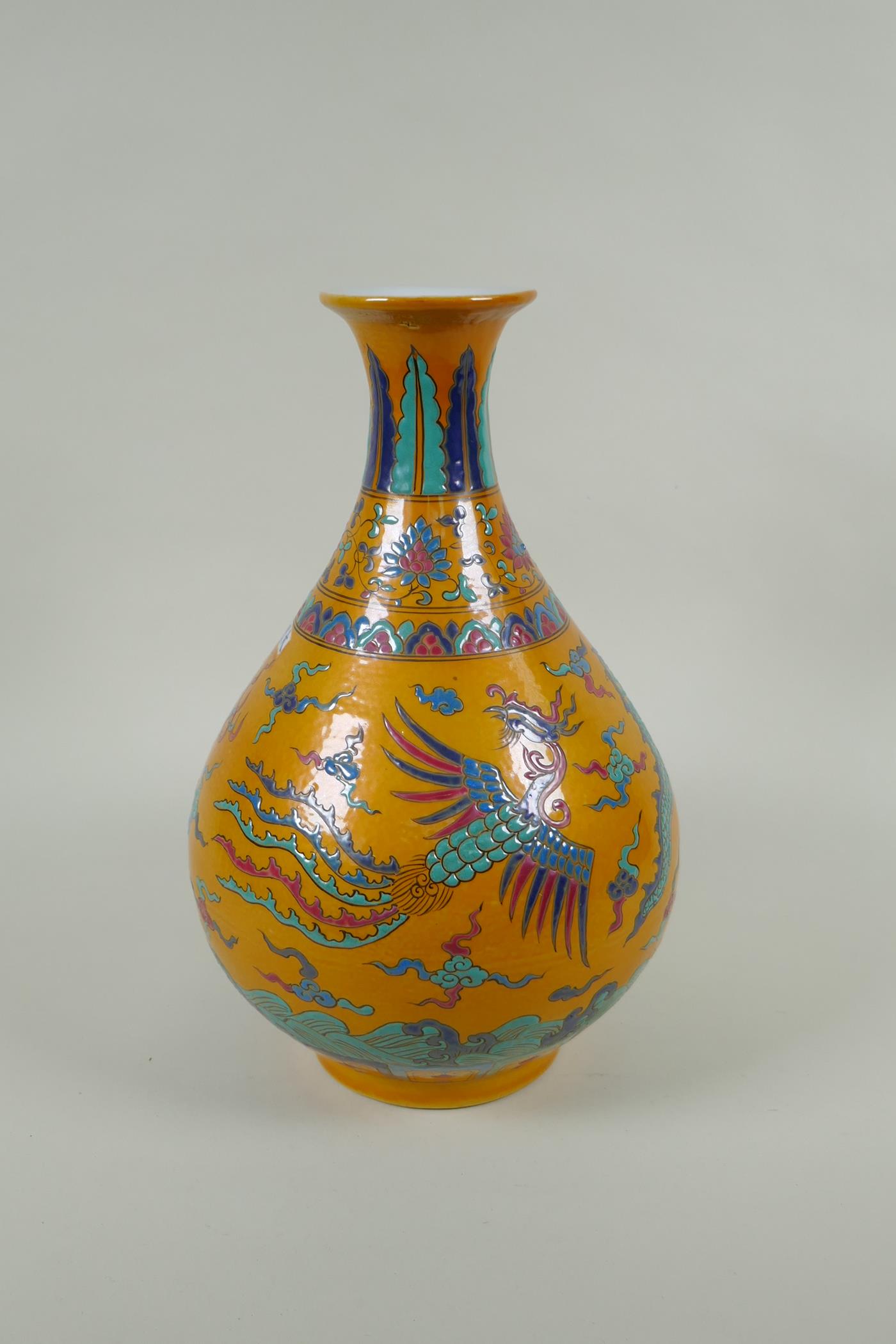 A Chinese yellow ground porcelain pear shaped vase with enamel decoration of a dragon and phoenix, - Image 3 of 6