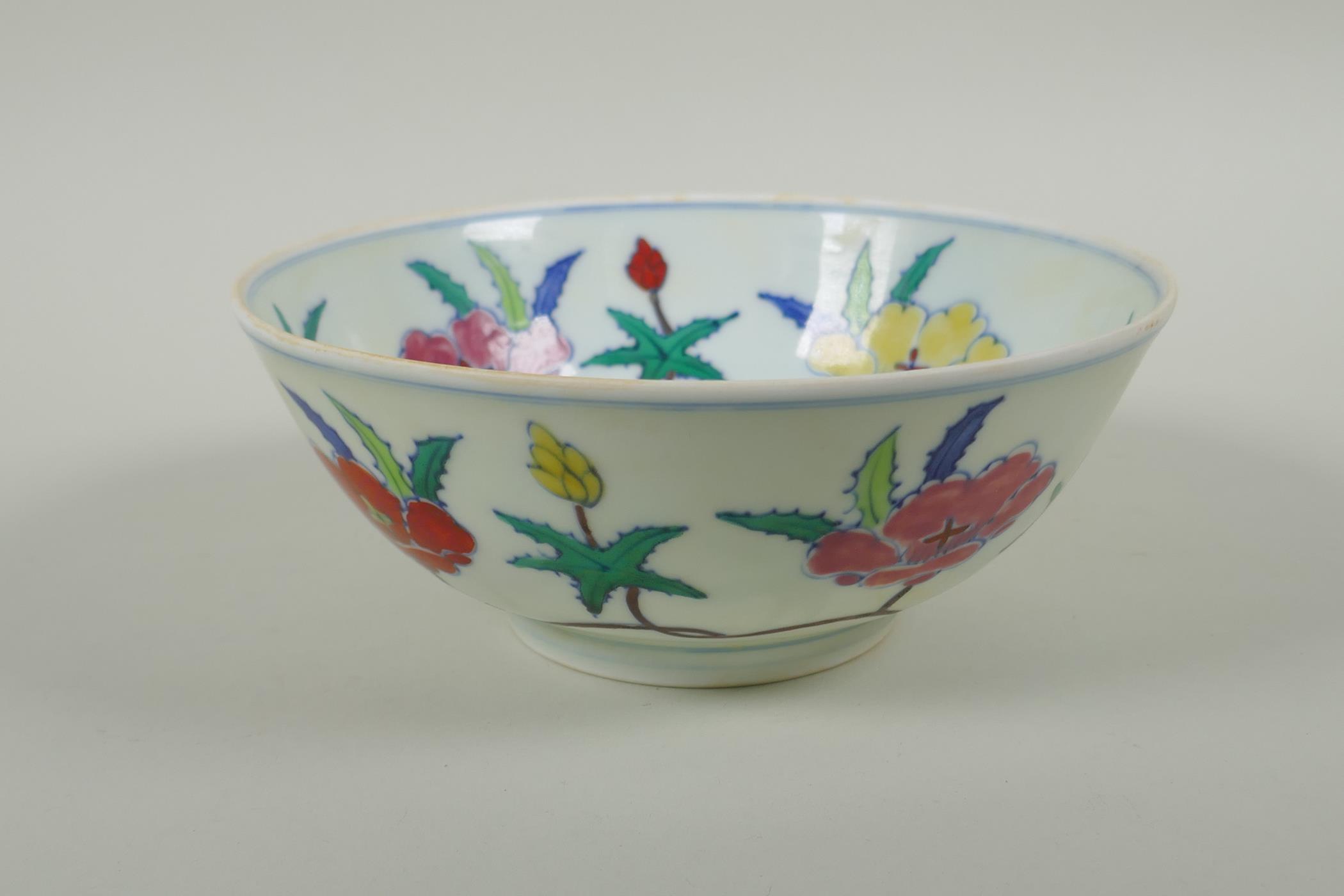 A Chinese Wucai porcelain bowl with floral decoration, Chenghua 6 character mark to base, 19cm