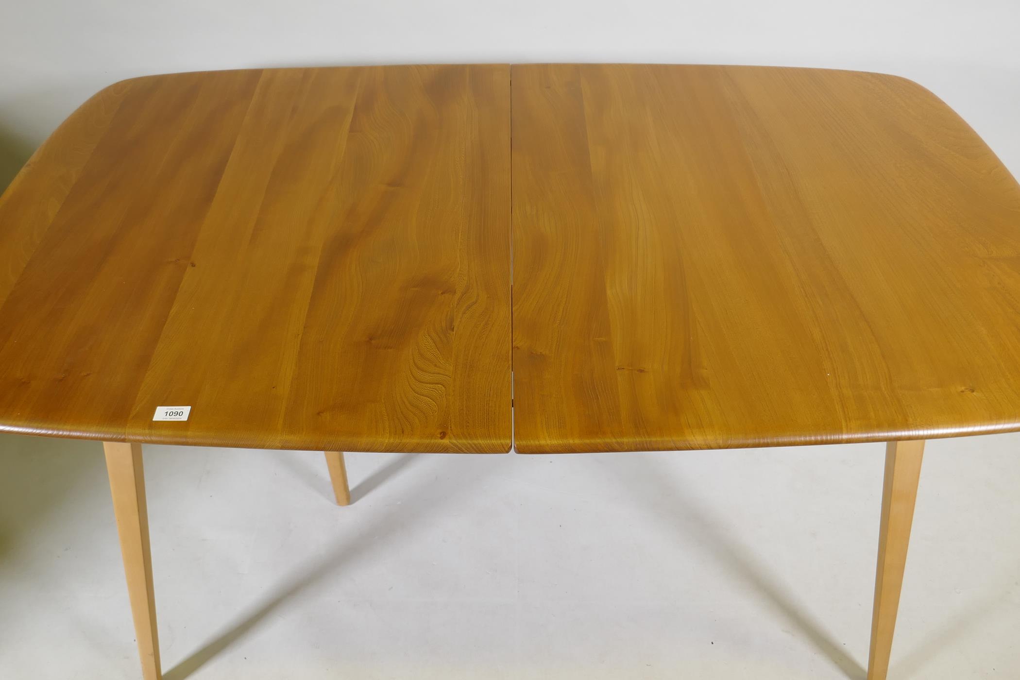 An Ercol Grand Windsor blond elm and beech extending dining table Model 444, and six matching Ercol - Image 6 of 8