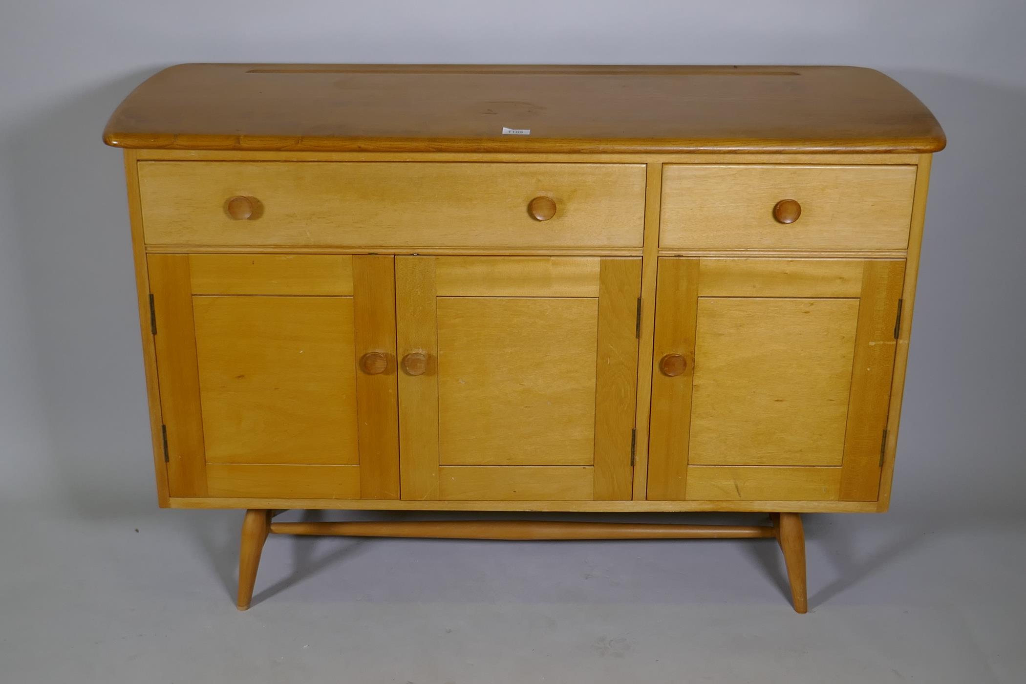 An Ercol Model 351 beech and elm top sideboard, with two drawers, one fitted with cutlery slide, - Image 2 of 4