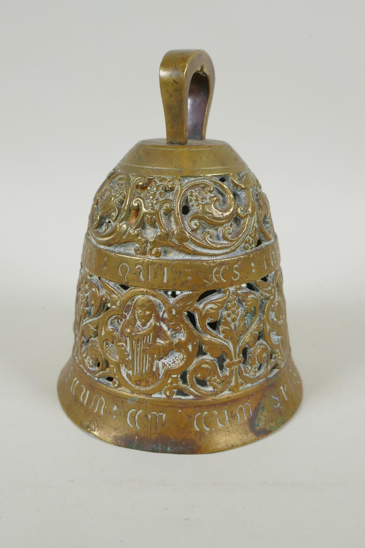An antique pierced bronze prayer bell decorated with depictions of angelic musicians and Catholic - Image 3 of 6