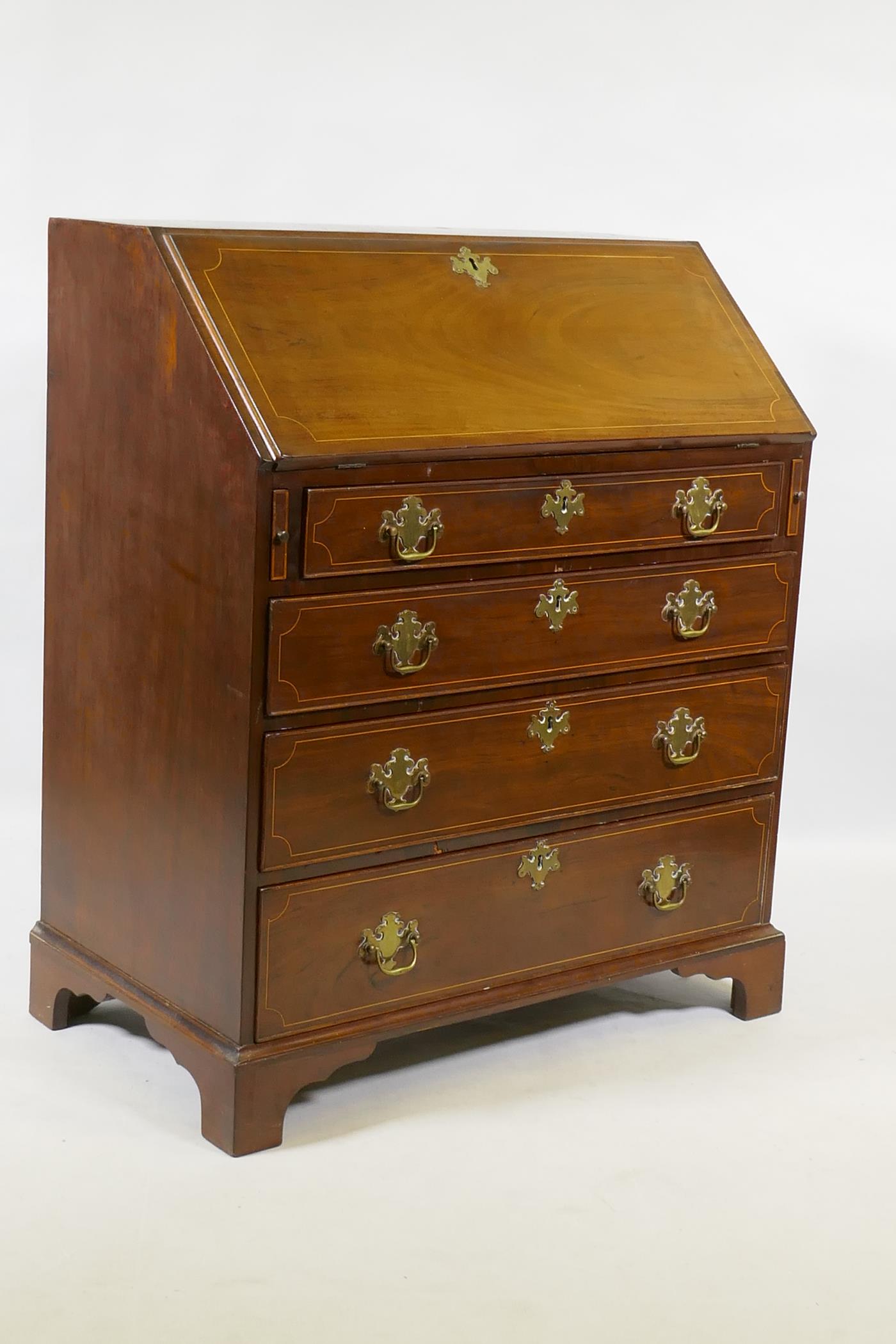 A Georgian inlaid mahogany bureau of small proportions, the fall front with fitted interior over - Image 3 of 3