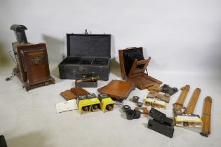A Thornton Pickard Standard plate camera, with tripod supports, mahogany plate cases, a Coronet