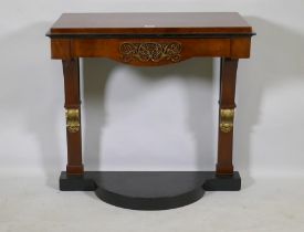A C19th Continental secessionist style mahogany console table with ebonised details and ormolu