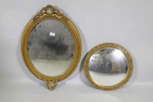 A vintage gilt oval wall mirror, 72cm high, and a later circular convex mirror