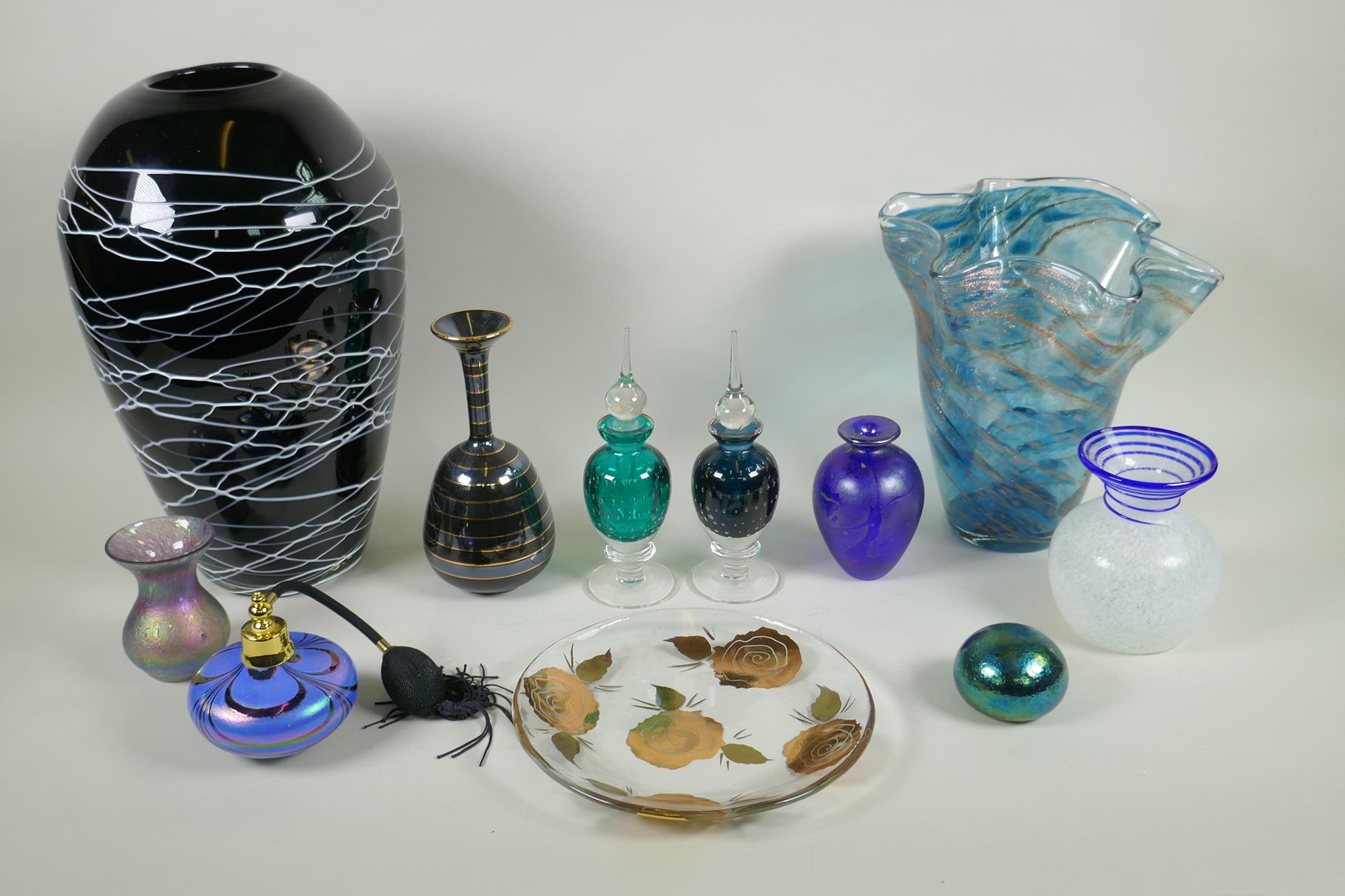 A quantity of assorted art glass ware to include a Murano handkerchief vase, a blue lustre atomiser,