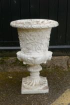 A painted reconstituted stone garden planter with twin mask decoration, by Papinia, 61cm high,