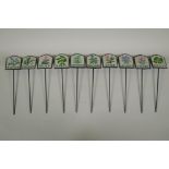 Ten painted cast metal herb markers, 28cm