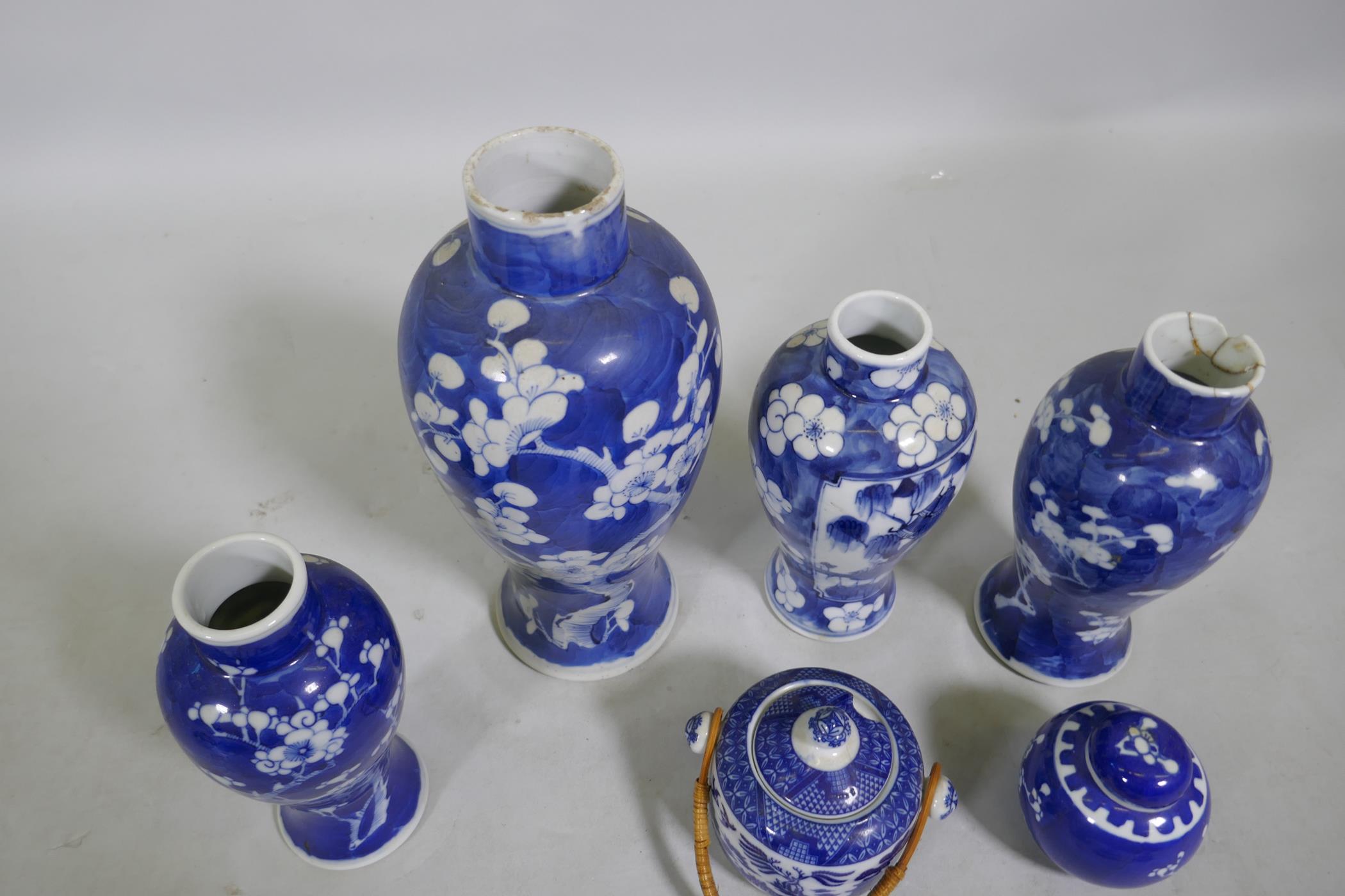 A collection of C19th Chinese blue and white vases with prunus on cracked ice decoration, mismatched - Image 2 of 6