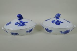 A pair of Royal Copenhagen blue and white porcelain tureens with floral decoration and lemon