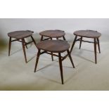 Four mid century stained Ercol adapted stools