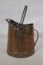 An antique Arts & Crafts copper coal scuttle, 38cm high