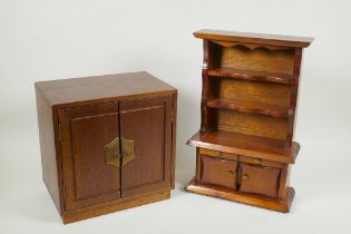 An American Oriental style jewellery cabinet with bars mounts, and a miniature pine dresser, 37cm