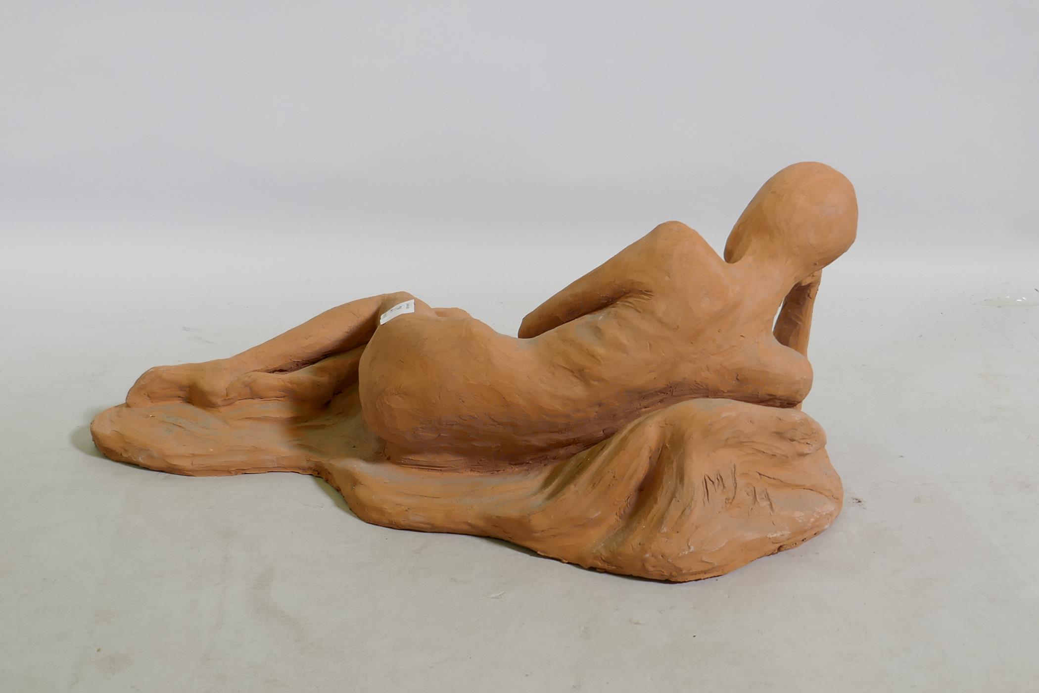 A terracotta sculpture of a reclining nude, inscribed MJ 94, 46 x 21cm - Image 2 of 4