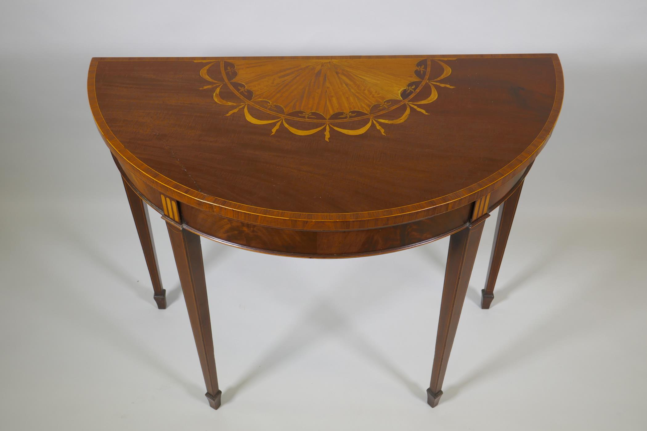 A Georgian mahogany demi lune card table, fiddle back mahogany with satinwood inlaid fan and - Image 2 of 4