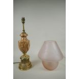 A vintage lilac glass mushroom lamp with etched leaf decoration, and a turned stone and brass
