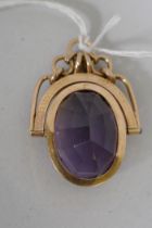 A 14ct gold fob watch with inset gemstone (topaz?), 3.5cm long, 7.7g