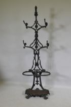 A painted cast iron stick and hat stand, 137cm high