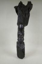 An African carved iron wood head bust, 72cm high