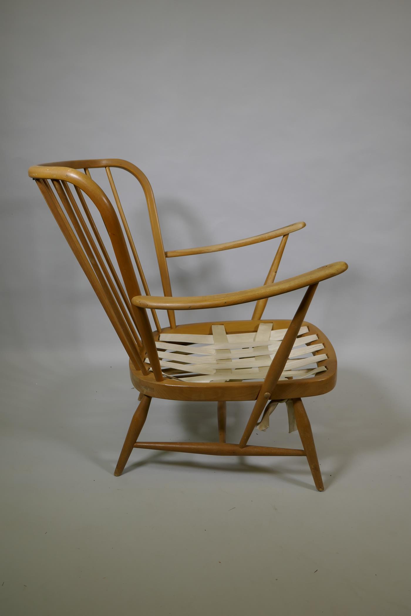 An Ercol beech and elm Windsor tall back armchair Model 478, and a similar Ercol model 334 armchair - Image 7 of 8