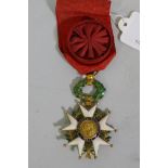 A French Legion d'Honneur medal with officer's ribbon