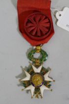 A French Legion d'Honneur medal with officer's ribbon