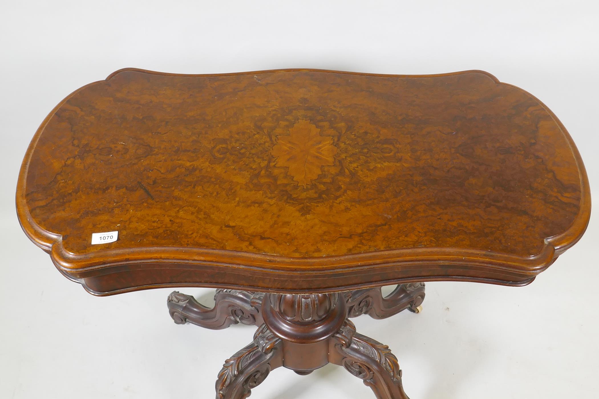 A Victorian burr walnut shaped top card table, raised on a carved and turned column and cabriole - Image 2 of 4