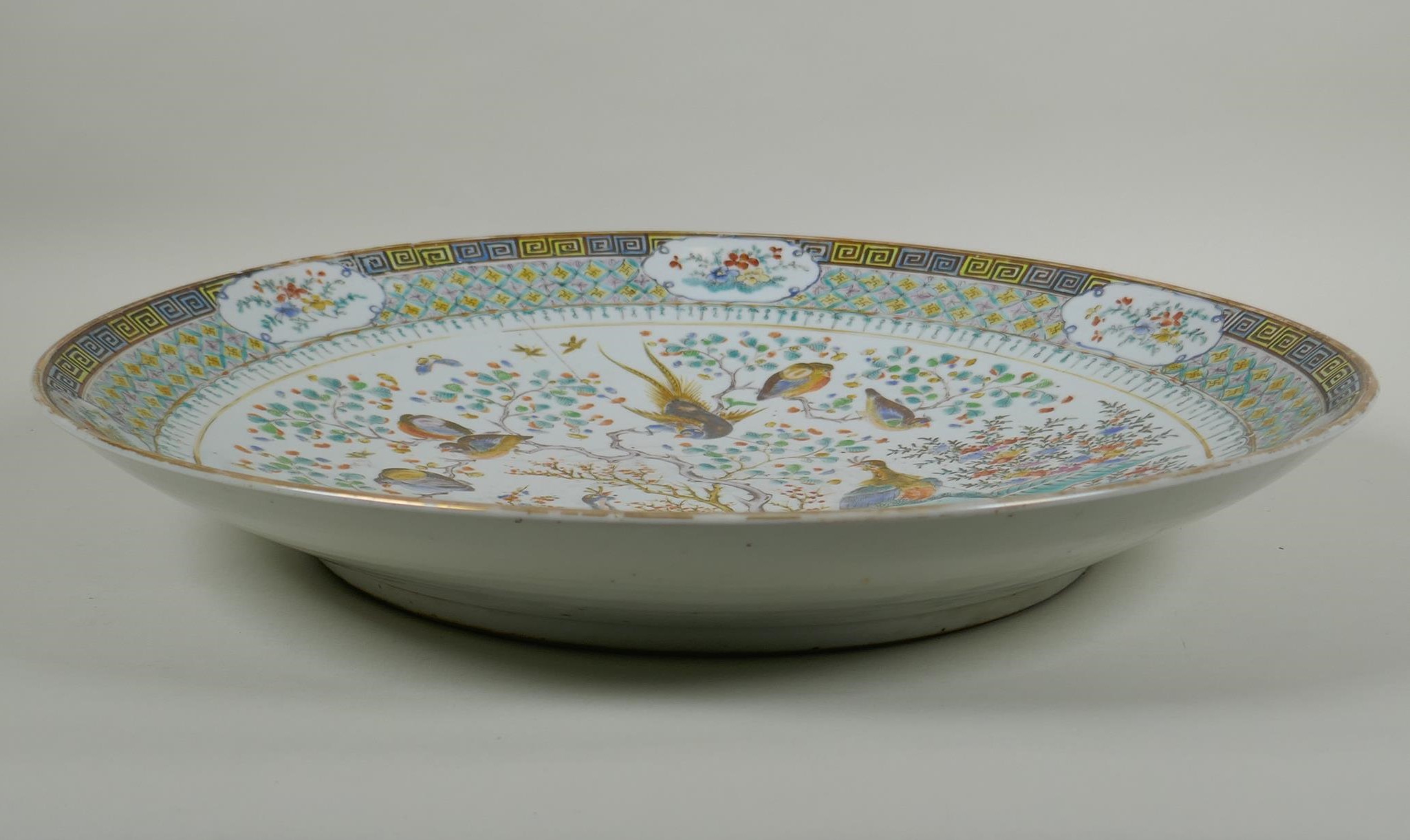 An C18th/C19th Chinese famille verte porcelain charger decorated with peacocks and asiatic birds - Image 3 of 8