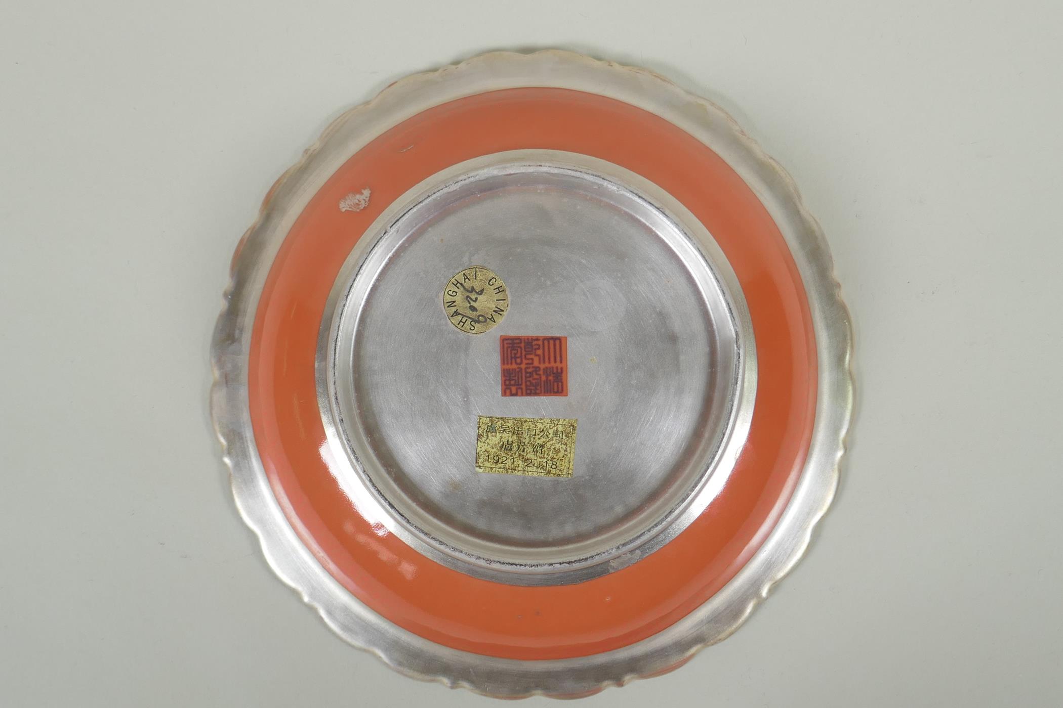 A Chinese salmon pink and silver glazed porcelain dish with lobed rim, with raised deer and crane - Image 4 of 5