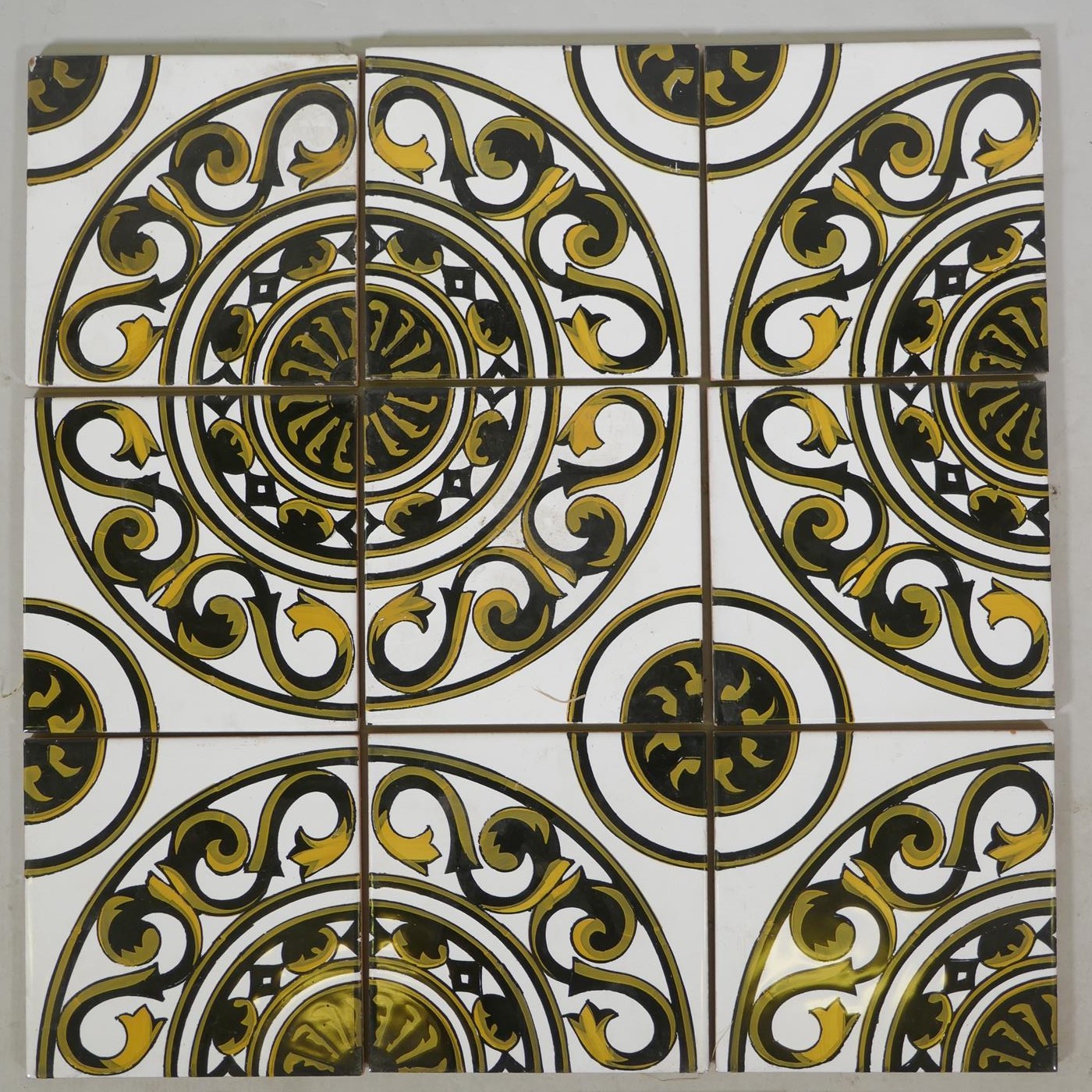 Eleven Spanish terracotta tiles with a black and gold repeating pattern, (two AF), and two other - Image 2 of 4
