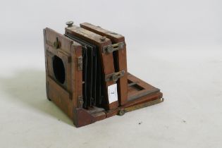 E & T Underwood, Birmingham, a mahogany cased plate camera, retailed by Benetfink & Co, 17 x 17 x