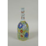 An antique Chinese polychrome porcelain mallet shaped bottle vase, with enamelled floral