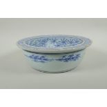 An early C20th Chinese blue and white porcelain steep sided bowl decorated with armed figures,