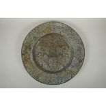 An antique heavy Egyptian  bronze tray decorated with depictions of pharaoh and hieroglyphics,