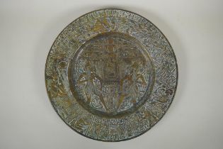 An antique heavy Egyptian  bronze tray decorated with depictions of pharaoh and hieroglyphics,