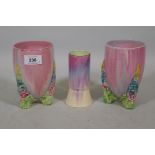 A pair of Clarice Cliff Wilkinsons My Garden pattern vase, and a Newport vase, 15cm high