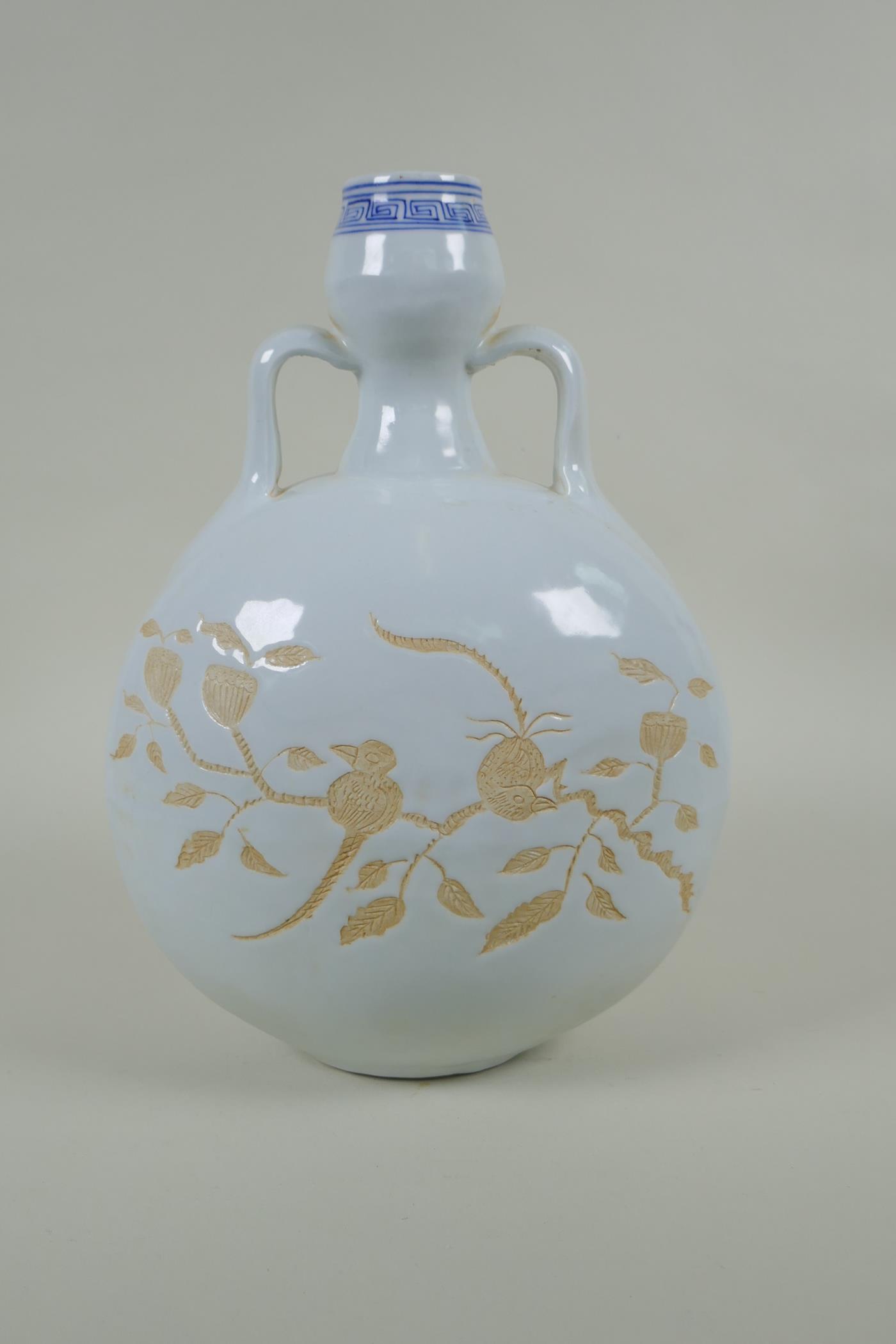 A Chinese blue and white porcelain moon flask with two handles and chased decoration of birds on a - Image 3 of 4