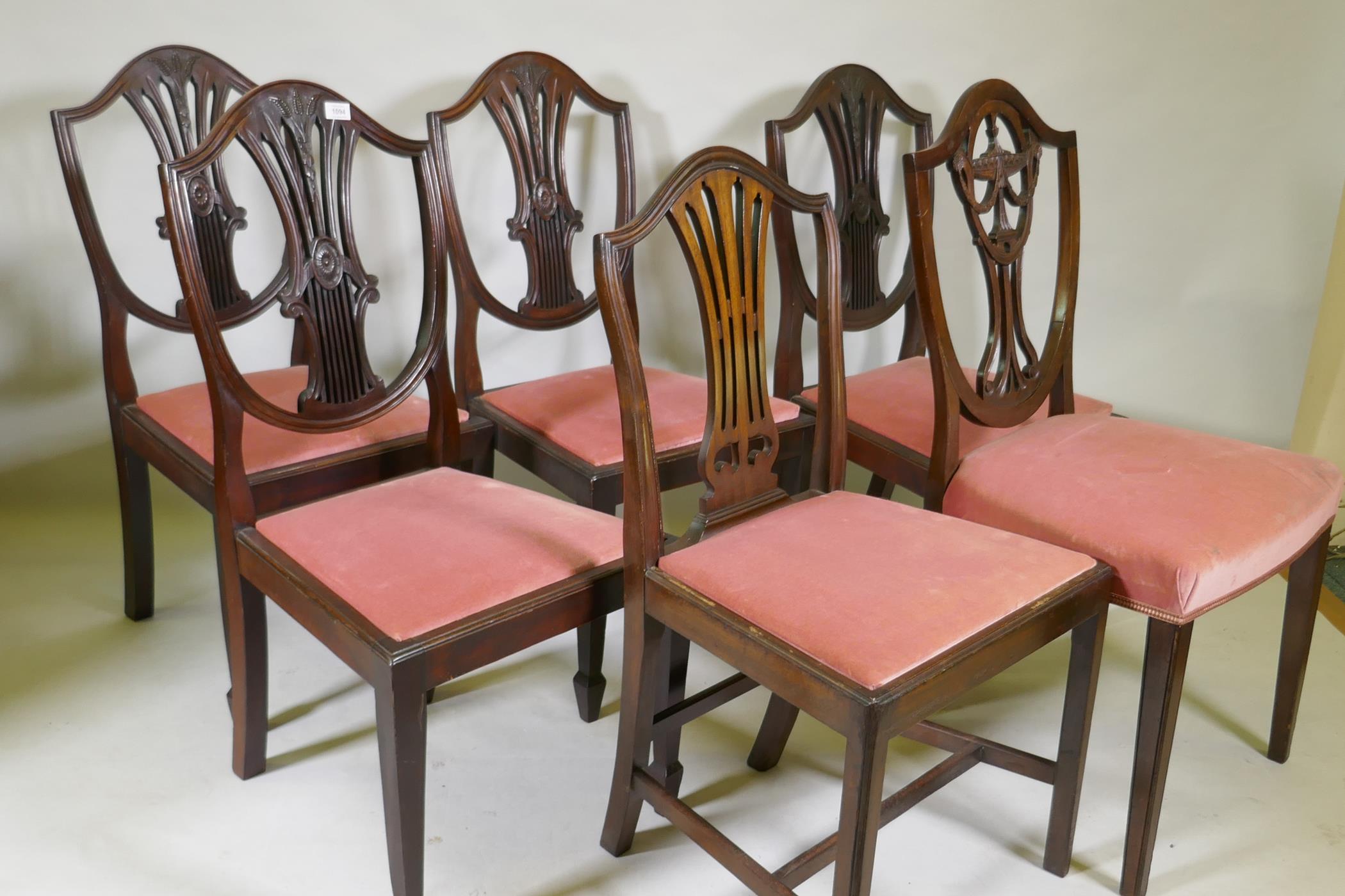 Four Hepplewhite style shield back mahogany dining chairs and two similar