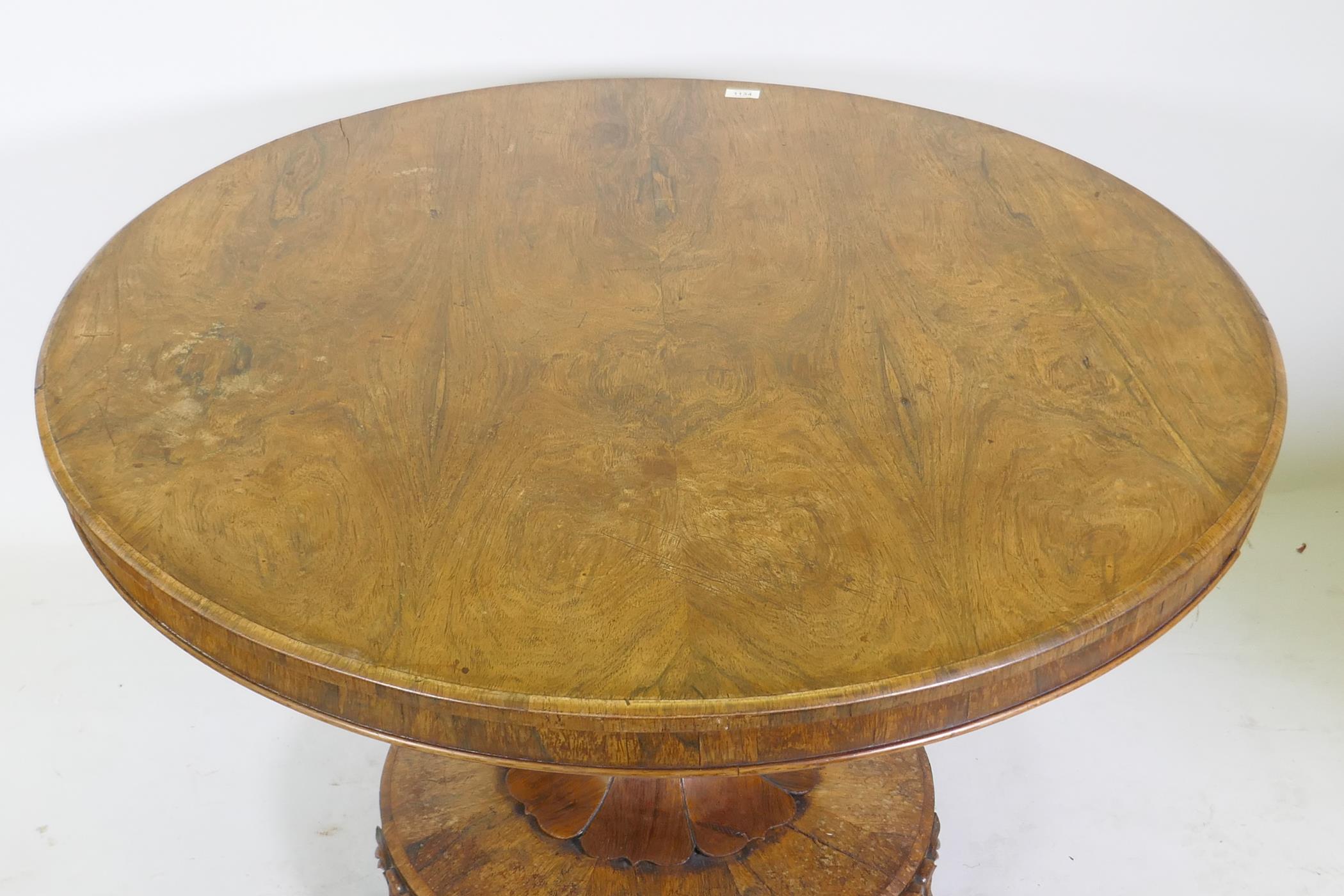 A C19th rosewood tilt top breakfast table, raised on a shaped column with carved detail and platform - Image 2 of 7