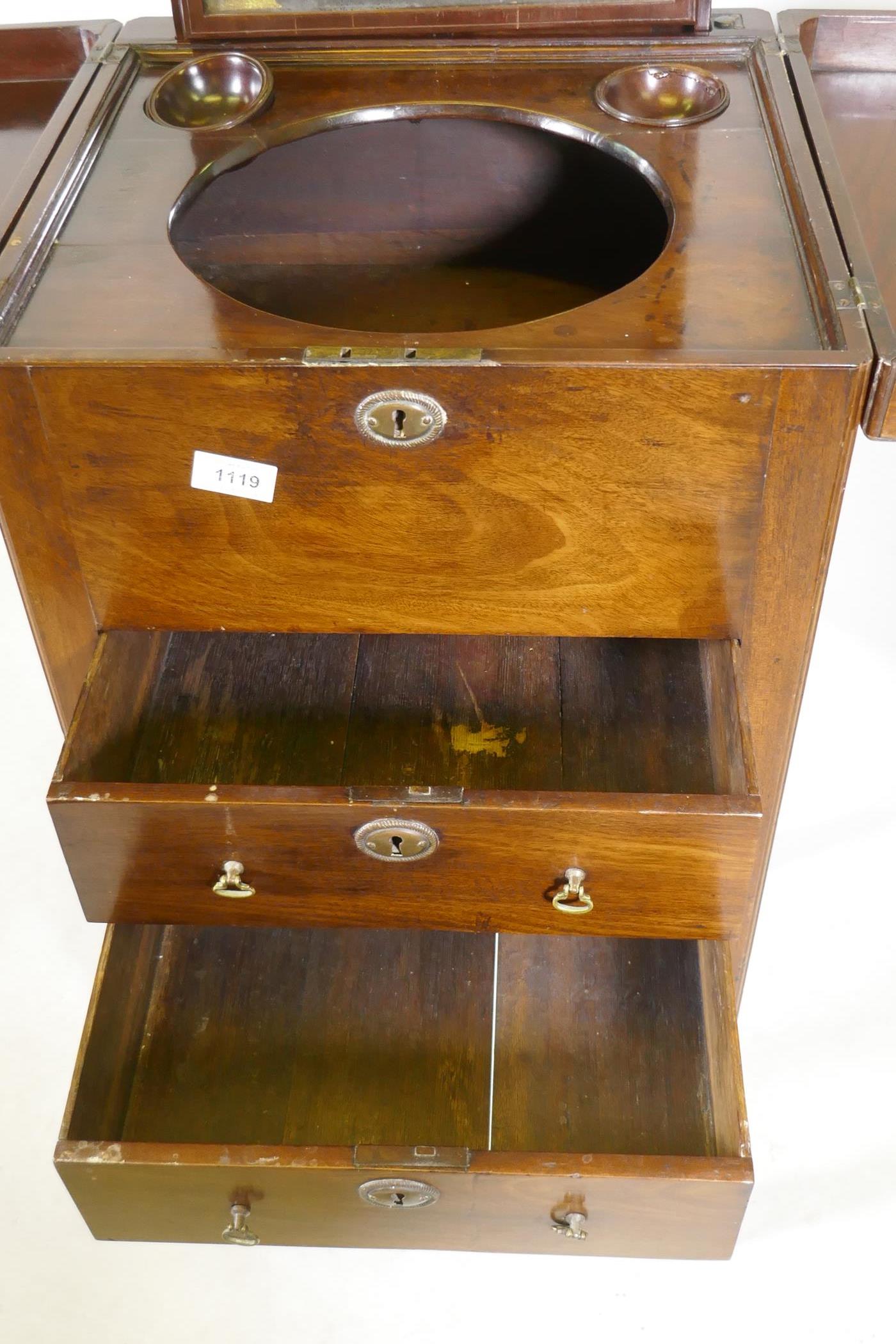 A Georgian mahogany gentleman's washstand, the fold out top with fitted interior and turned wood - Image 4 of 9