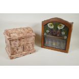 A painted and distressed wood jewellery chest with metal straps, and a hanging glass fronted spice