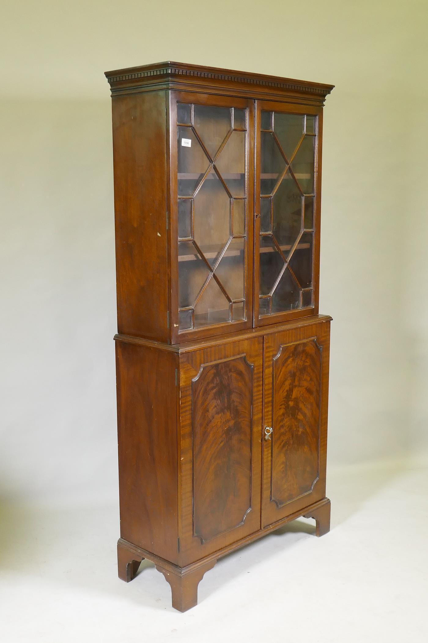 A small Georgian style mahogany bookcase in two sections, the upper with astragal glazed doors, - Image 2 of 2