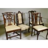 A Chippendale style elbow chair, two standard chairs, a balloon back and walnut high back nursing
