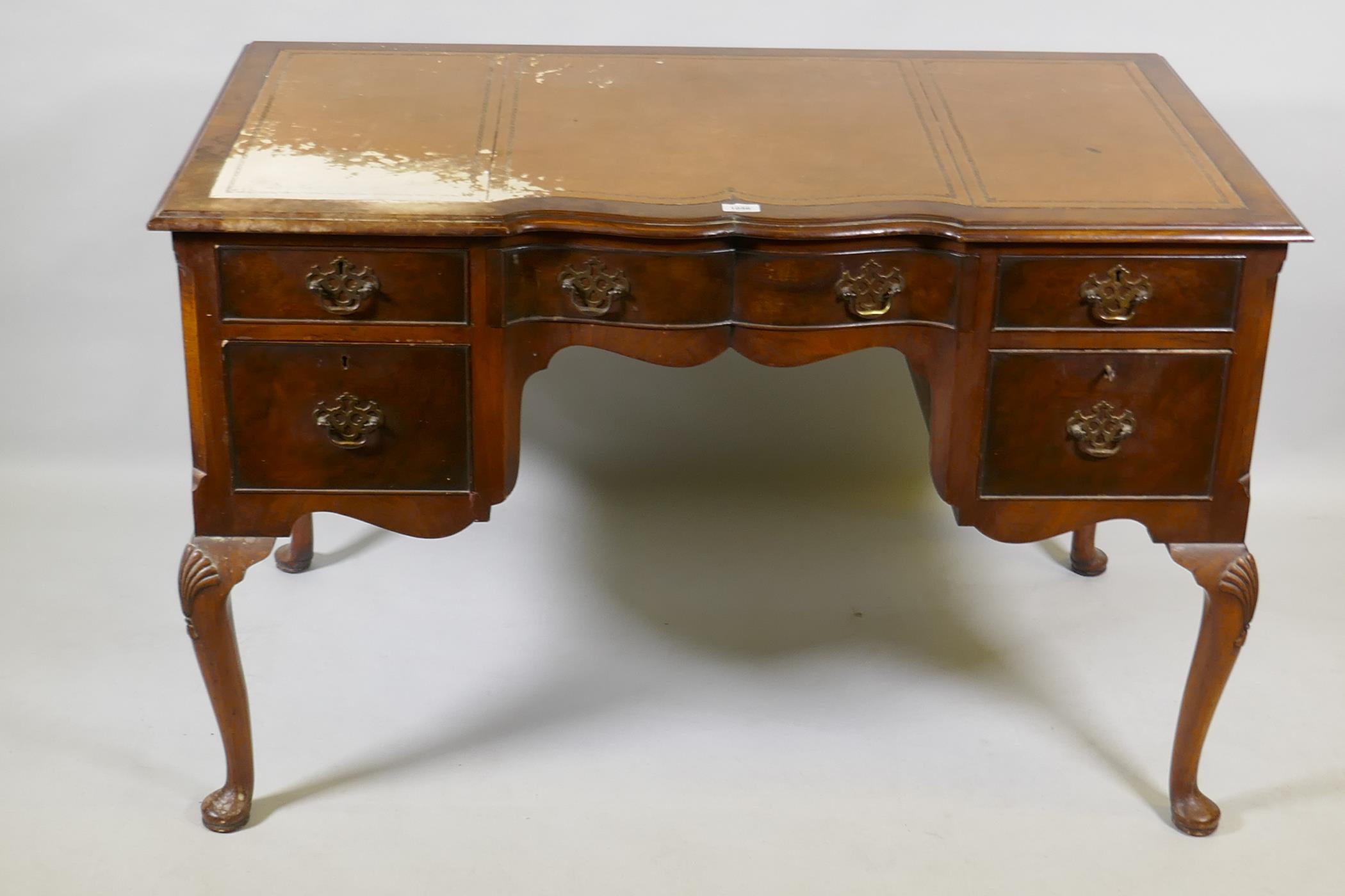 A Georgian style walnut five drawer kneehole desk with inset leather top, raised on cabriole - Image 2 of 2