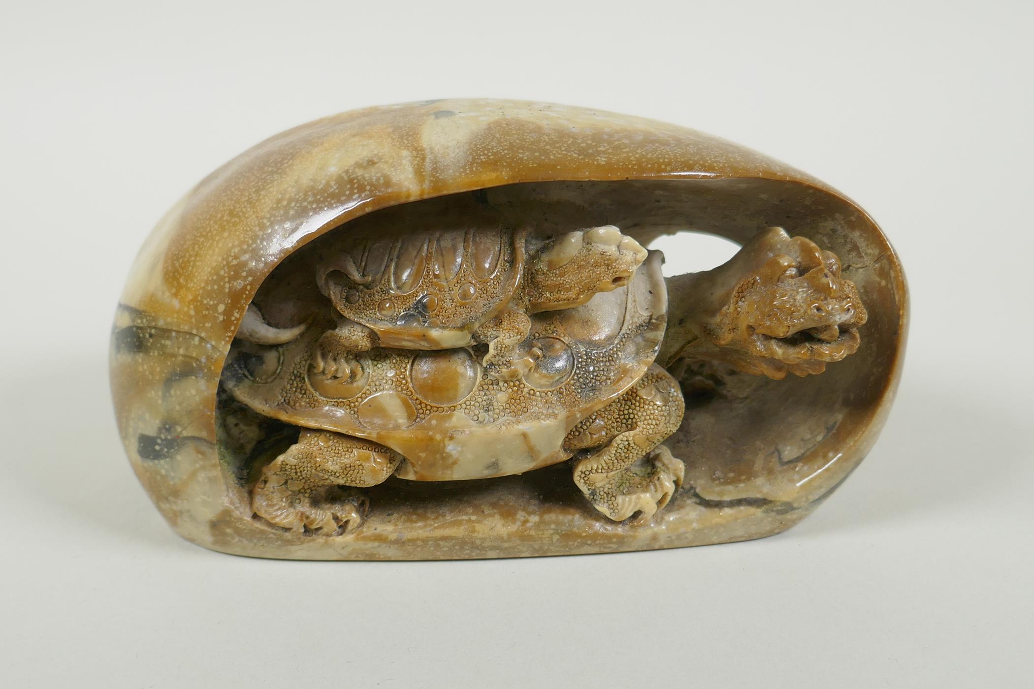 A Chinese reconstituted stone carving of a tortoise and its young, 17cm long