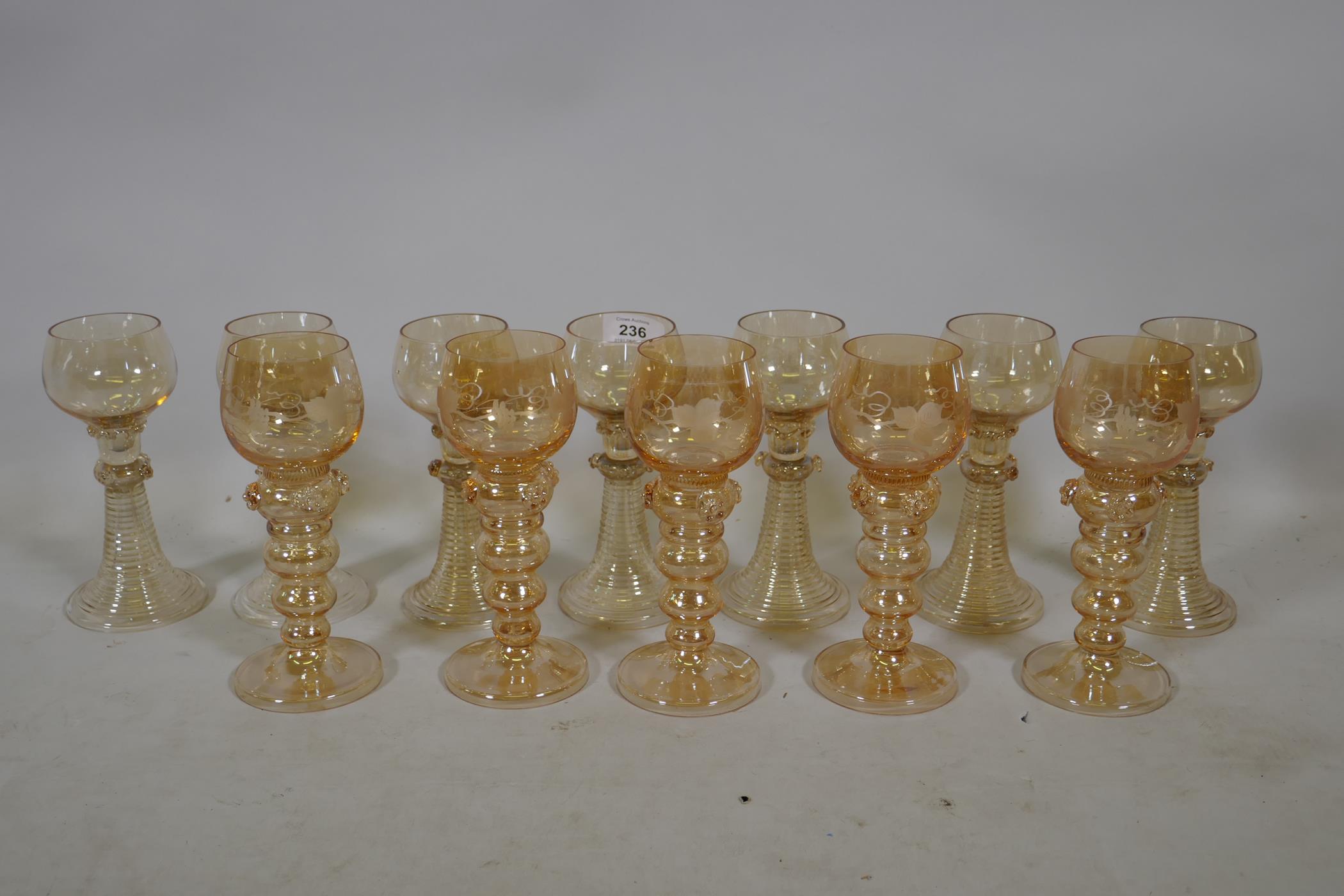 A set of seven C19th amber coloured Hock wine glasses, and five more similar with etched grape and - Image 2 of 4